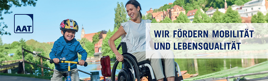 AAT - WIR FÖRDERN MOBILITÄT UND LEBENSQUALITÄT - Kind mit dem Fahrrad und die Frau mit der Rollstuhl
